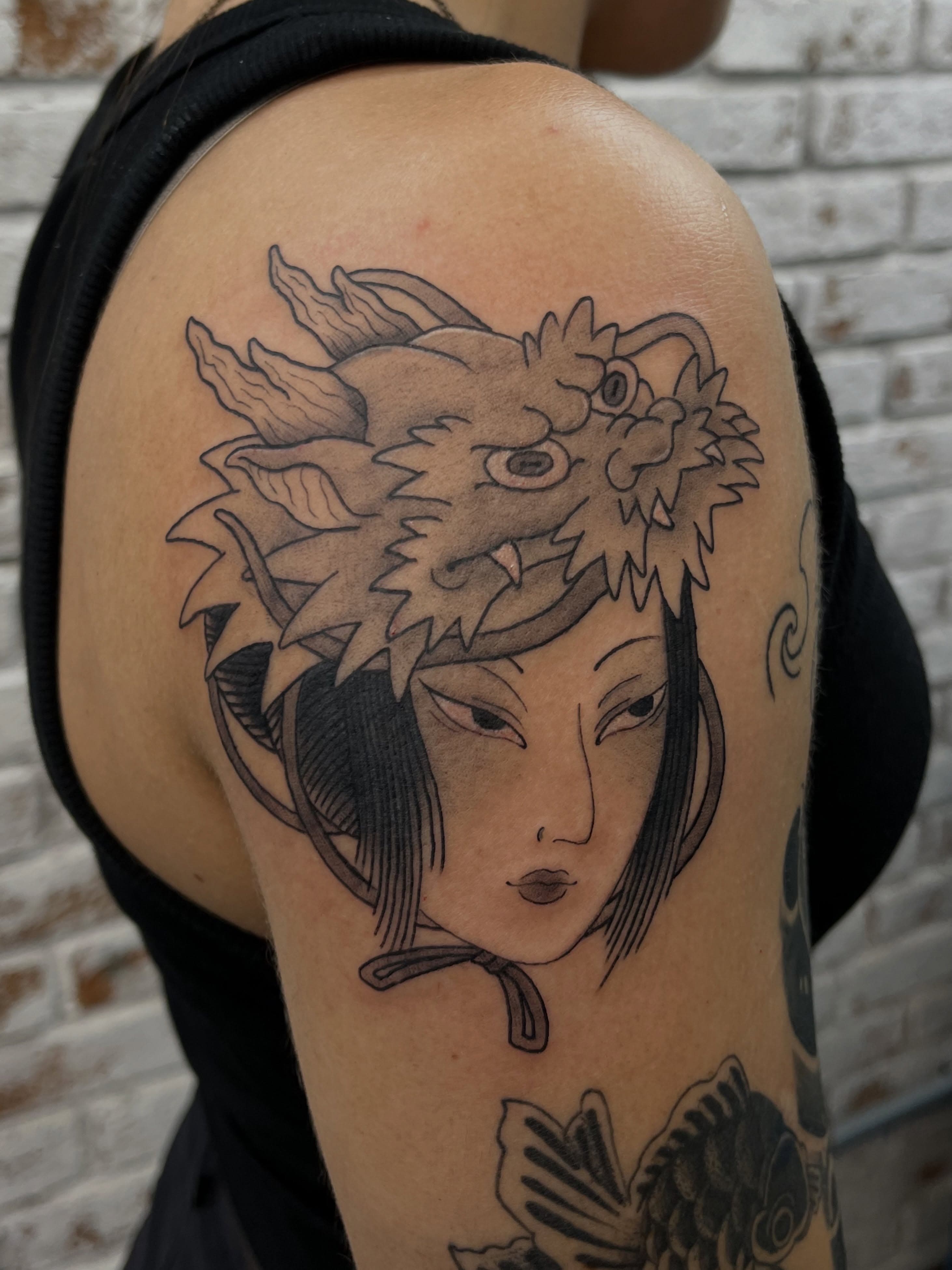Tatuagem por Yoshie Higa