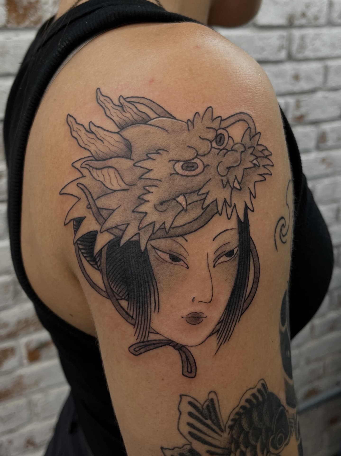 Tatuagem por Yoshie Higa